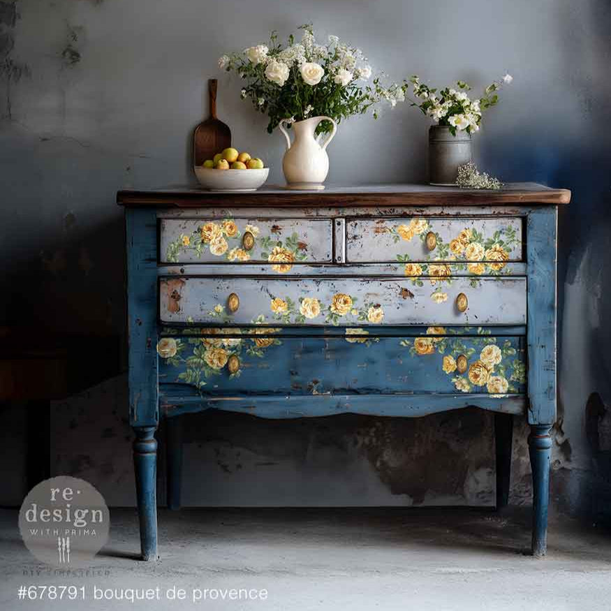 Vintage dresser with floral transfer design in a rustic setting