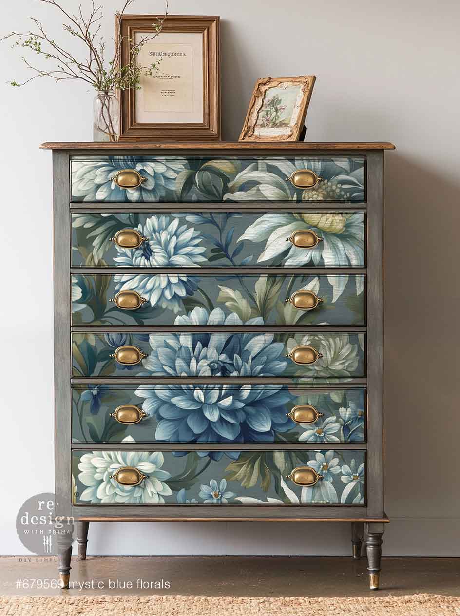 Floral pattern with blue and green flowers on a dark background