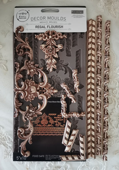 Decorative moulds packaging with decorative elements on a textured white background